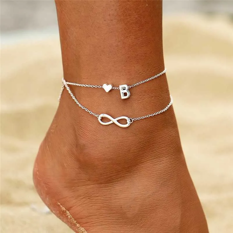 Cavigliere Boho Cavigliera iniziale Cuore Infinity Colore argento Bracciale alla caviglia sulla catena della gamba 26 Lettera per le donne Gioielli da spiaggia 230607