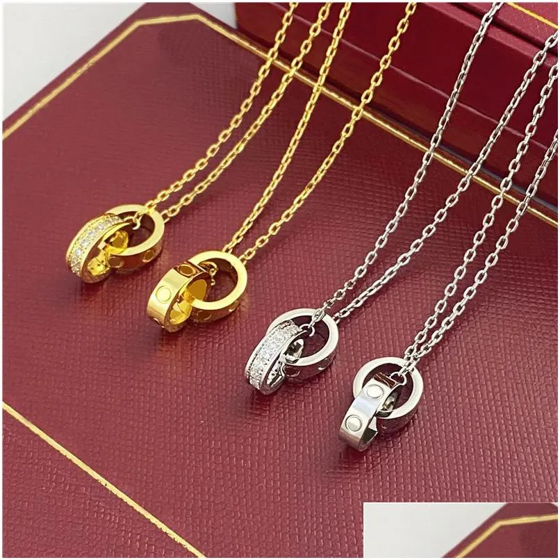 Pendentif Colliers Ras Du Cou Femmes Collier Pour Femme Amour Bijoux Or Double Anneau En Acier Inoxydable Jewlery Mode Ovale Verrouillage Rin Dhkwh