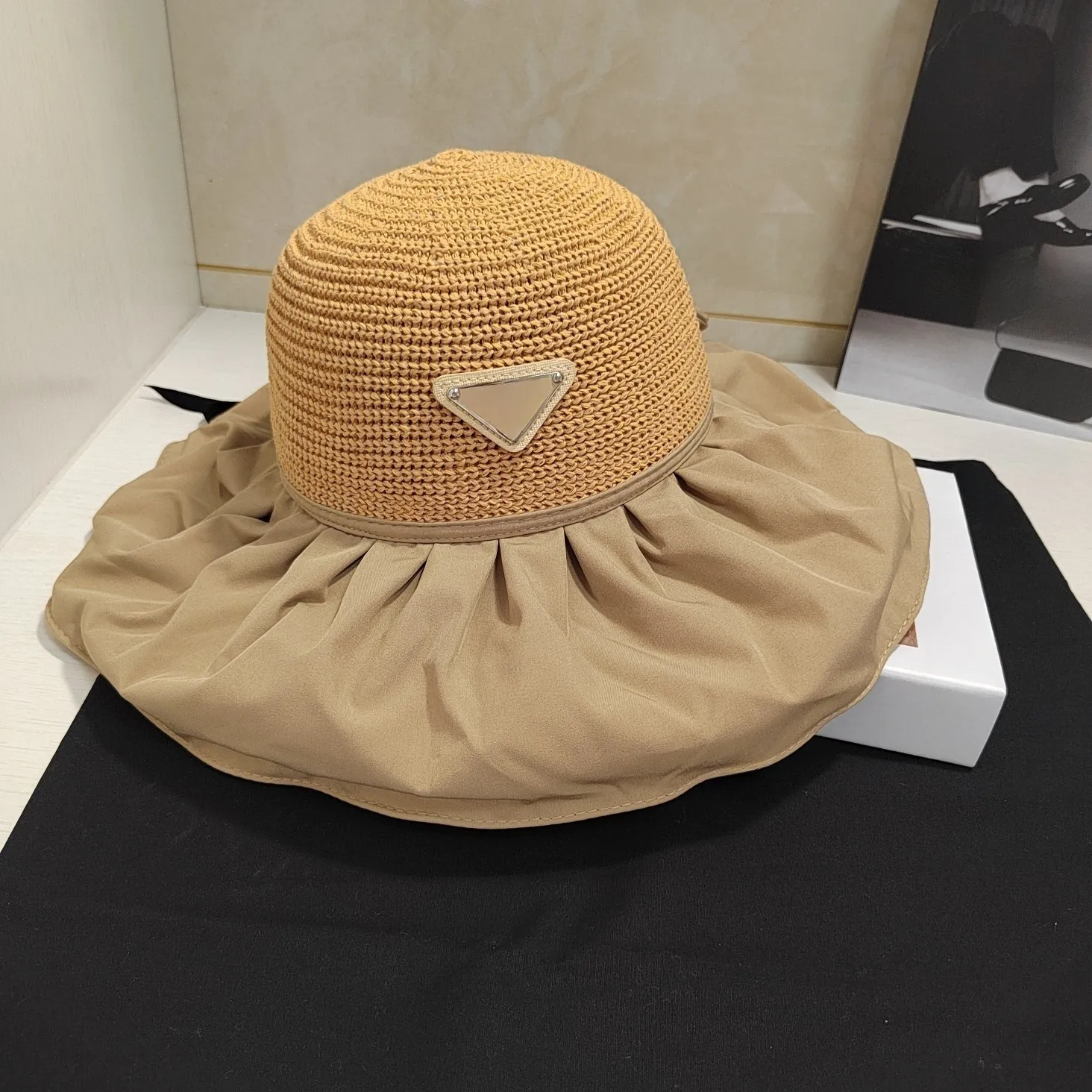 Nude prada bucket hat sales
