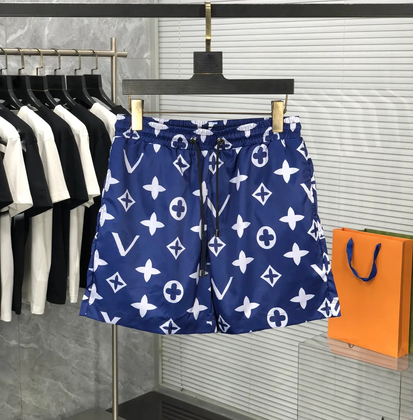 Fashion Mens Designer Shorts Schnell trocknen Badebekleidung Druck Sommerbrettbeachhosen Männer schwimmen kurzgröße QAQ