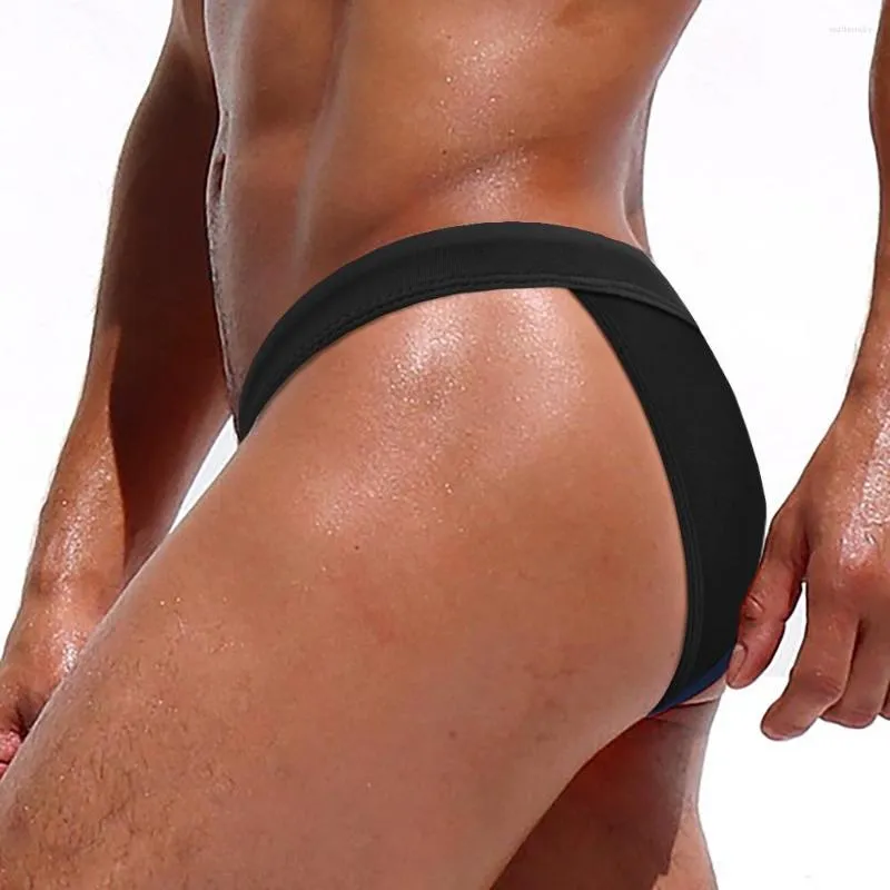 Roupa de banho masculina Sexy Lateral Oca Biquíni masculino G String Nylon Tanga de banho de secagem rápida masculina sólida almofada push up praia surfe maiô