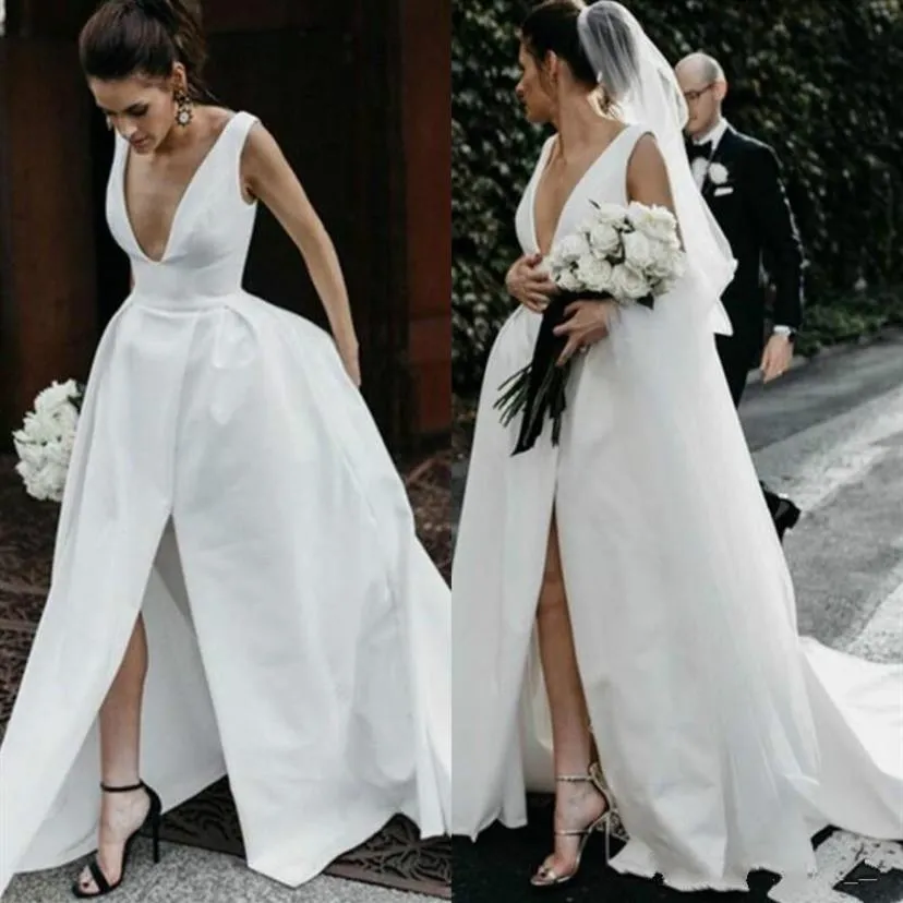 Romantyczne głębokie arabskie sukienki ślubne Arabskie satynowe suknie ślubne Piłka Backless Plus Size Saudi Country Custom Vestido de Novia Formal Brida314W