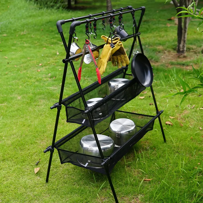 Handverktyg Camping Triangelhylla Aluminiumlegering Fällbar dubbelskikt Stor kapacitet med krok Net Bag Outdoor Glamping Picnic Hanging Rack 230617