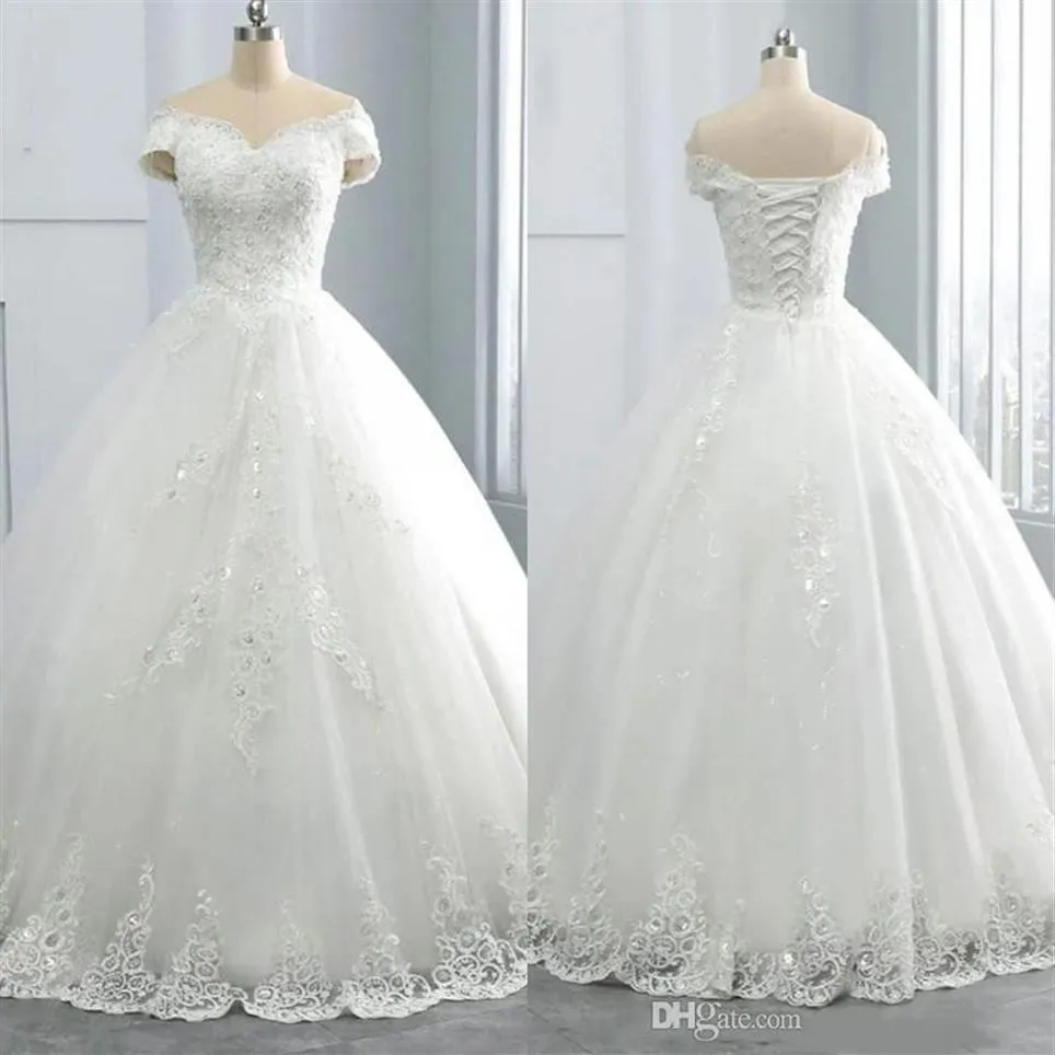 2021 Oszałamiające zimowe sukienki ślubne w szyku w dekolcie Aplikacje plus rozmiar poza ramionami suknia piłowa