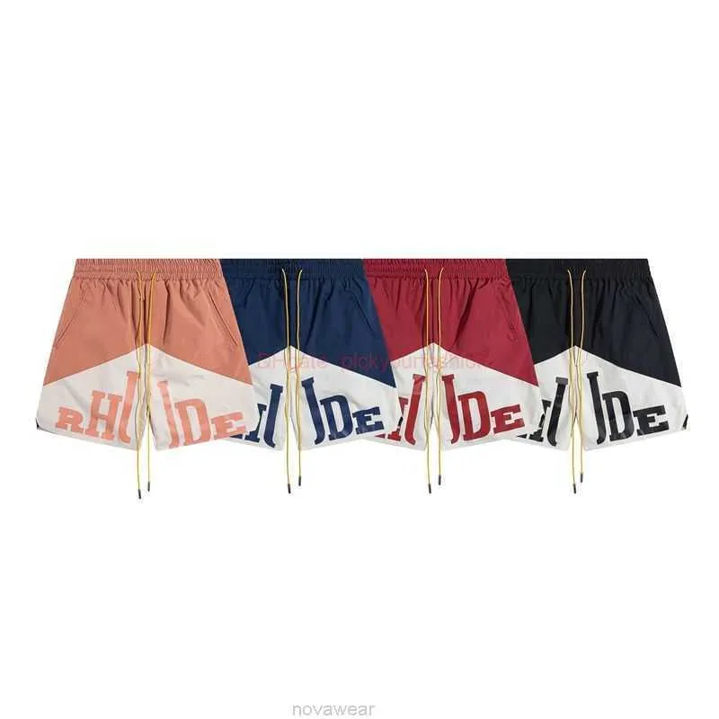 Shorts voor heren Designer korte mode kleding Strandshorts Rhude Letterprint Tweekleurige stiksels High Street Trekkoord Joggingbroeken Losse broeken Zomer Jogg