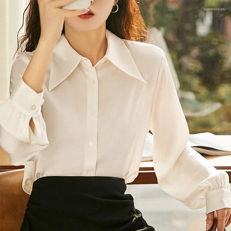 Blusa blanca holgada clearance