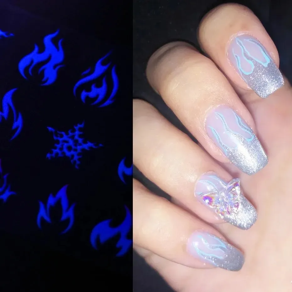My first time doing stiletto and my first time trying flame nail art. I  tried to make the flames on each nail different. Thoughts? : r/Nails