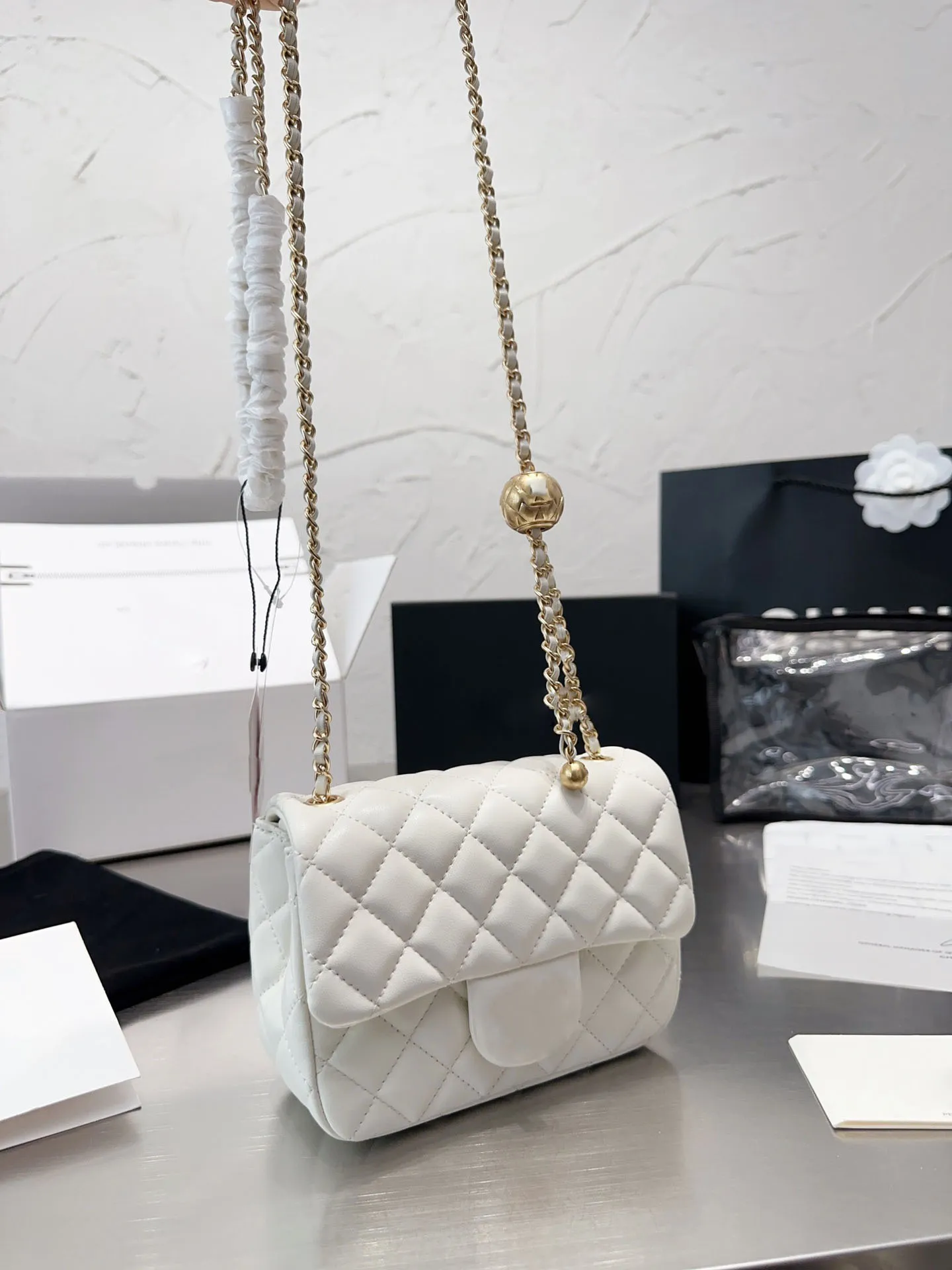 Buy White Crystal Round Shaped Ball Bag by BAG HEAD Online at Aza Fashions.