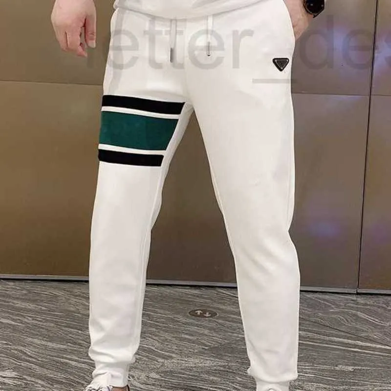 Pantalons pour hommes designer 2022 nouvelle mode Cargo hommes couleur unie grandes poches rayures rouges Patchwork décontracté Streetwear pantalons de survêtement U3XN