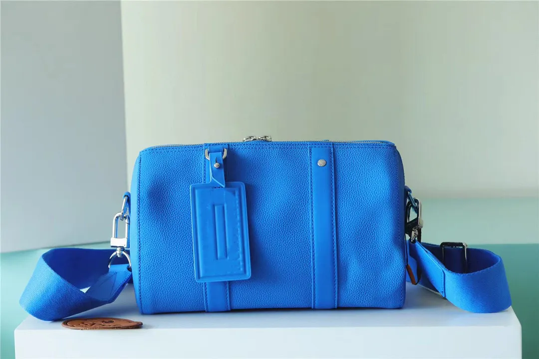 2023 Top femme copie originale Indigo Ce sac à main est en cuir de vache, montrant un beau style avec une texture fine. Marque de cuir et jacquard