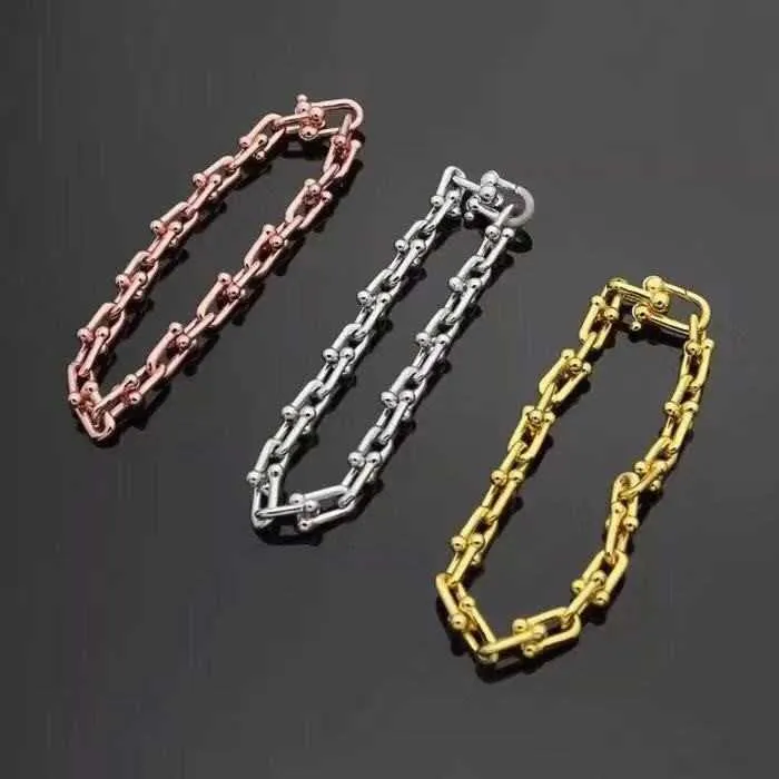 Original varumärke Lågprissatta smycken med bokstäver 18K Guld Titanium Steel Womens TFF Classic Back Shaped Armband