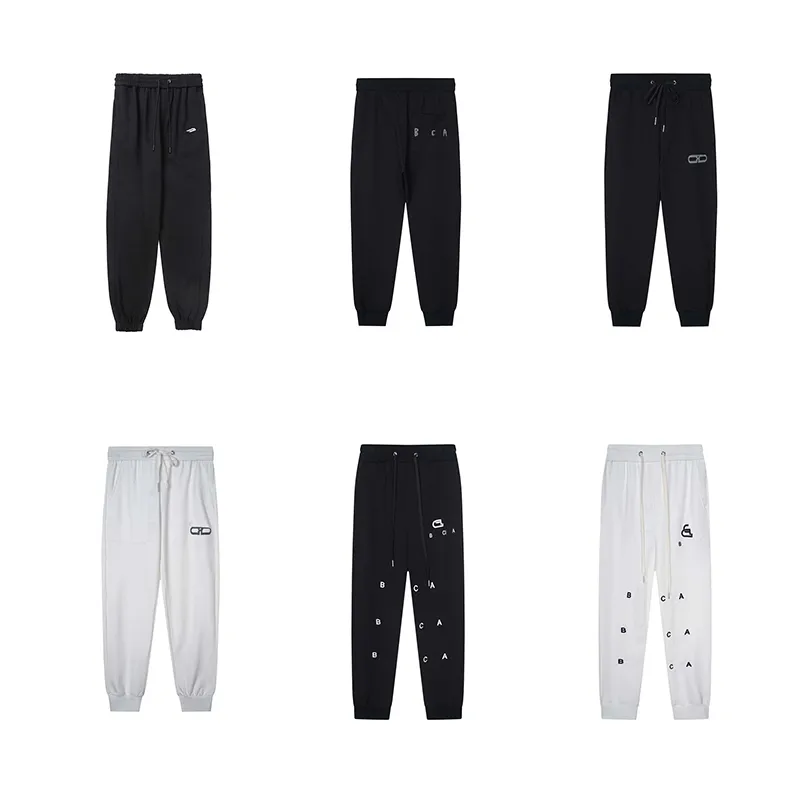 Herrenhosen Neue Hosen mit einfachem Muster, lässige, lockere Sporthose mit Kordelzug, Neun-Punkt-Jogginghose für Männer und Frauen