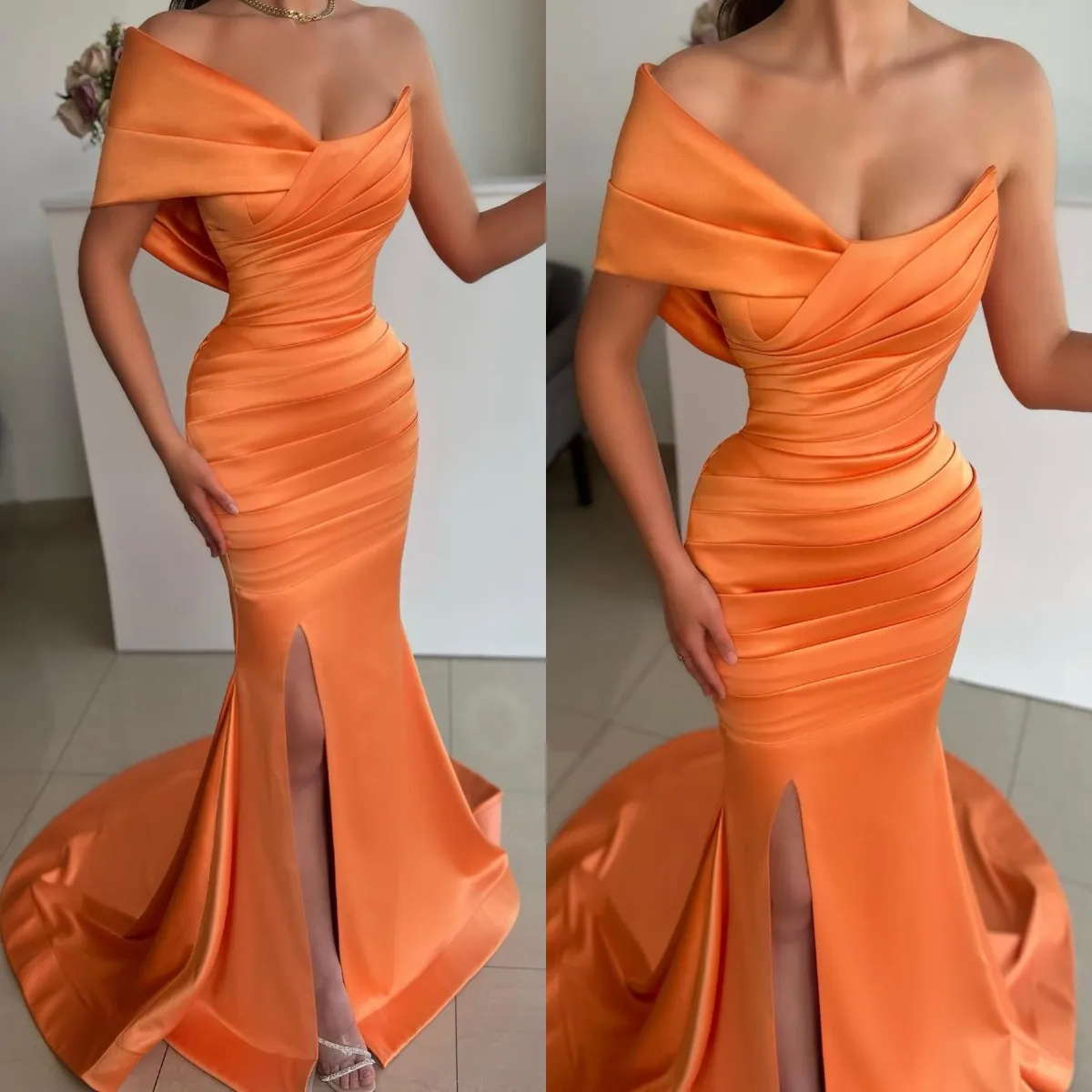 Elegante oranje avondjurken off-shoulder split feestjurk galajurk sweep train plooien formele lange jurk voor speciale gelegenheid op de rode loper