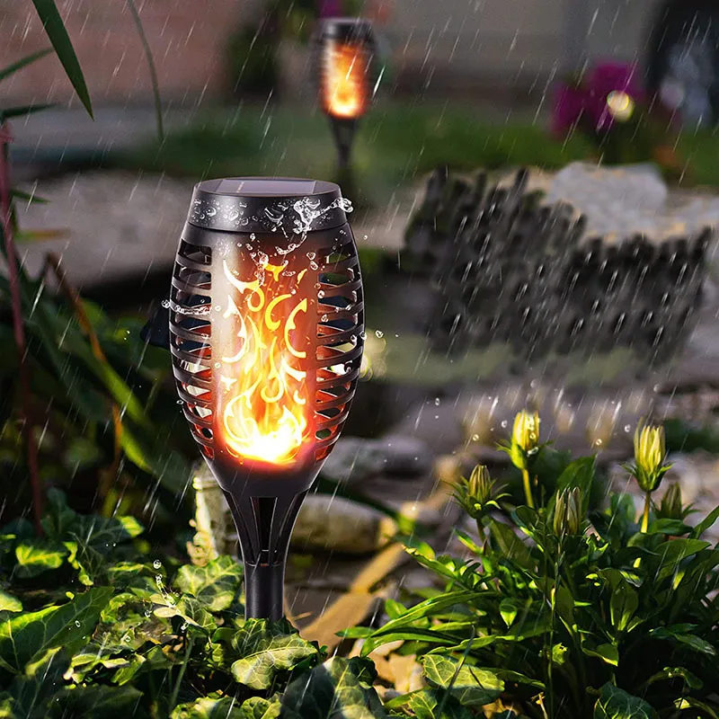 Spedizione gratuita impermeabile sfarfallio solare Effetto fiamma, 12 Luce di torcia solare a LED con palo per giardino Path Pathway Yard Vuole