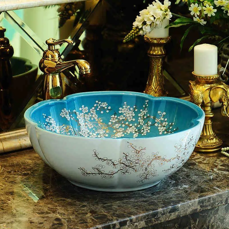 Jingdezhen fabbrica direttamente arte lavabo in ceramica dipinta a mano lavelli da bagno blu e bianco Cqrju