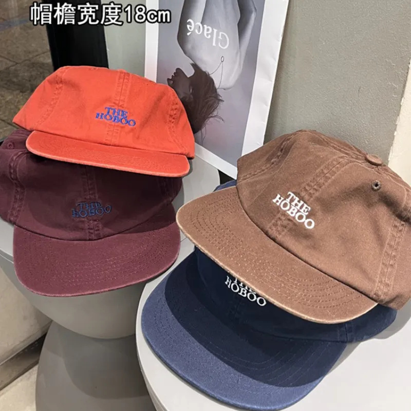 Bollkåpor högkvalitativ japansk retro baseball cap nisch mode plattbrimmade hatt män mångsidig bokstav broderi mjuka topp kvinnors hattar 230621