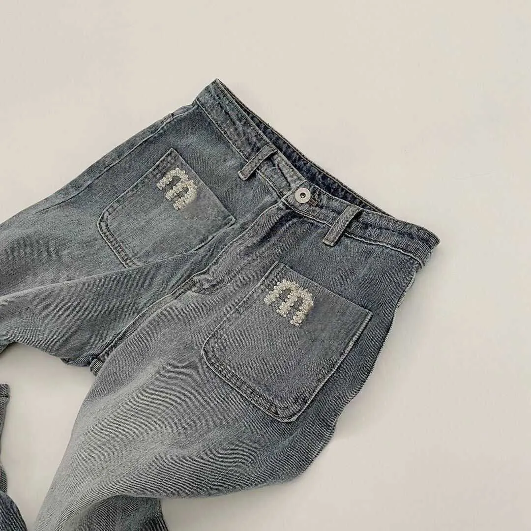 Damskie dżinsowe odzież dżinsy dżinsy kieszonkowe list do gwoździ haftowane dżinsowe spodnie sprężyna wysoka talia szerokie nogi dżinsy