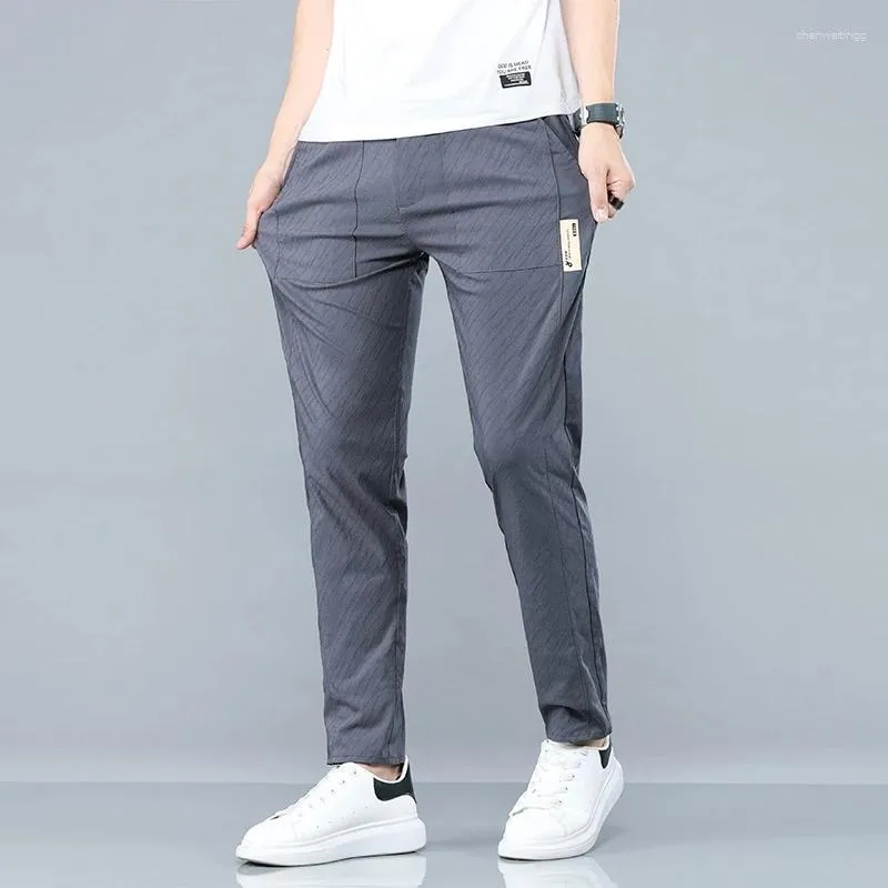 Pantaloni da uomo 2023 pantaloni estivi da uomo larghi dritti sottili casual coreani con coulisse in seta traspirante con tasca con zip maschile