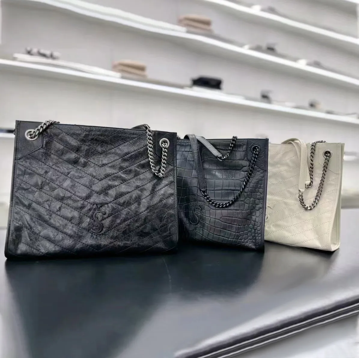 Fourre-tout de luxe pour femmes Enveloppe de magasin d'épaule Sac pour hommes Portefeuilles à rabat en cuir véritable Sacs à main