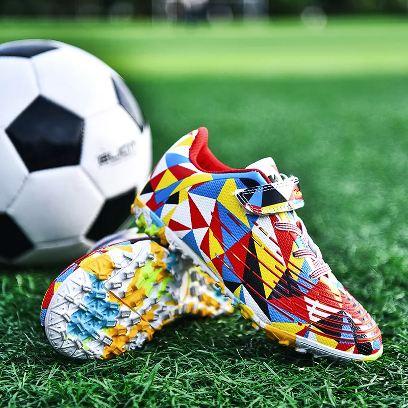 Zapatillas de futbol sala para Niño de color rojo y azul