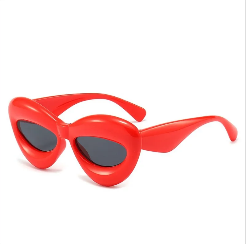 Lunettes de soleil œil de chat gonflées à la mode pour femmes surdimensionnées cadre épais forme de lèvre amusante bonbons lunettes de soleil colorées