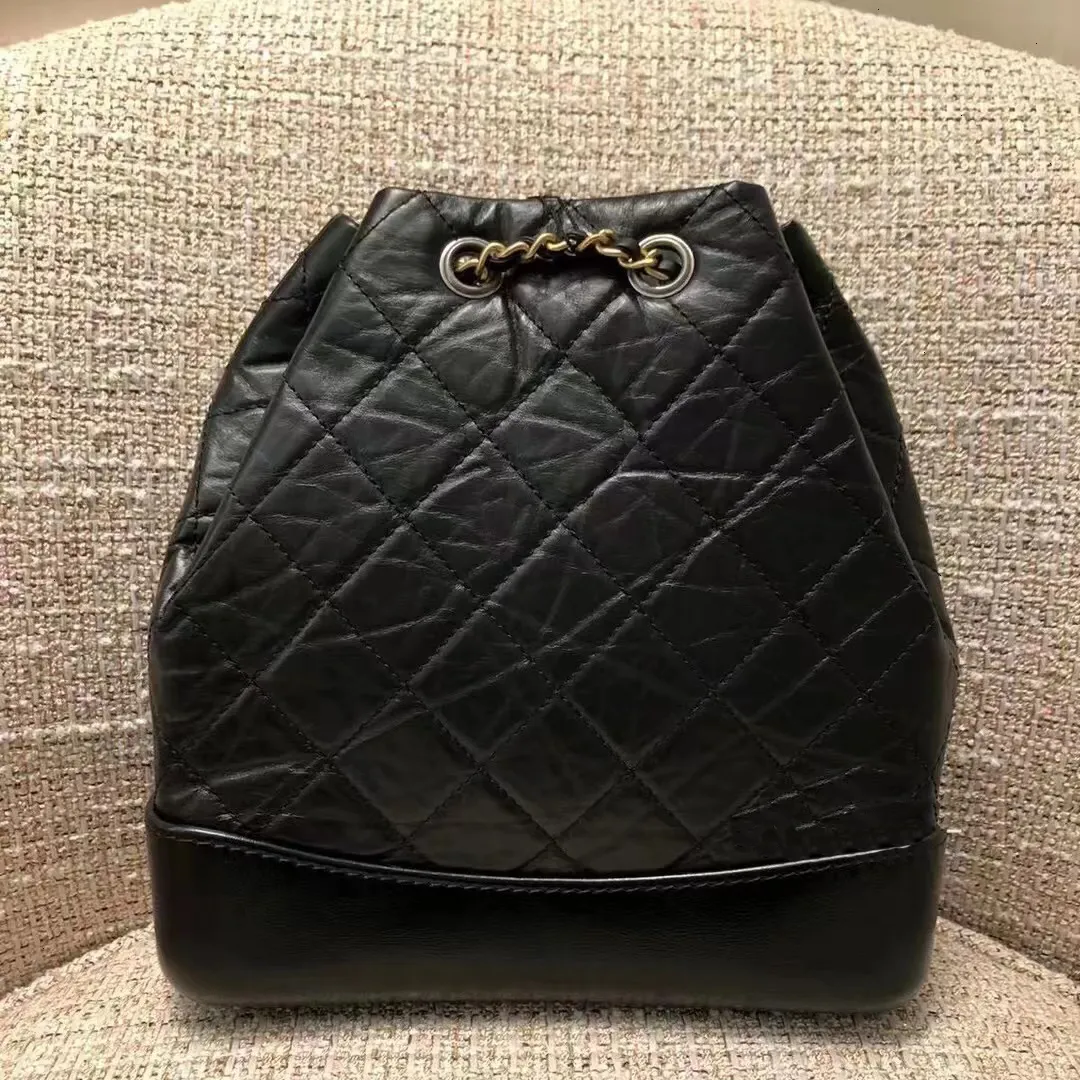 Kvinnors arrangör Koppling axel hobo ryggsäck väska rem äkta läder stora kapacitet handväskor tygväskor män designer purses resor skola korskropp kosmetisk väska