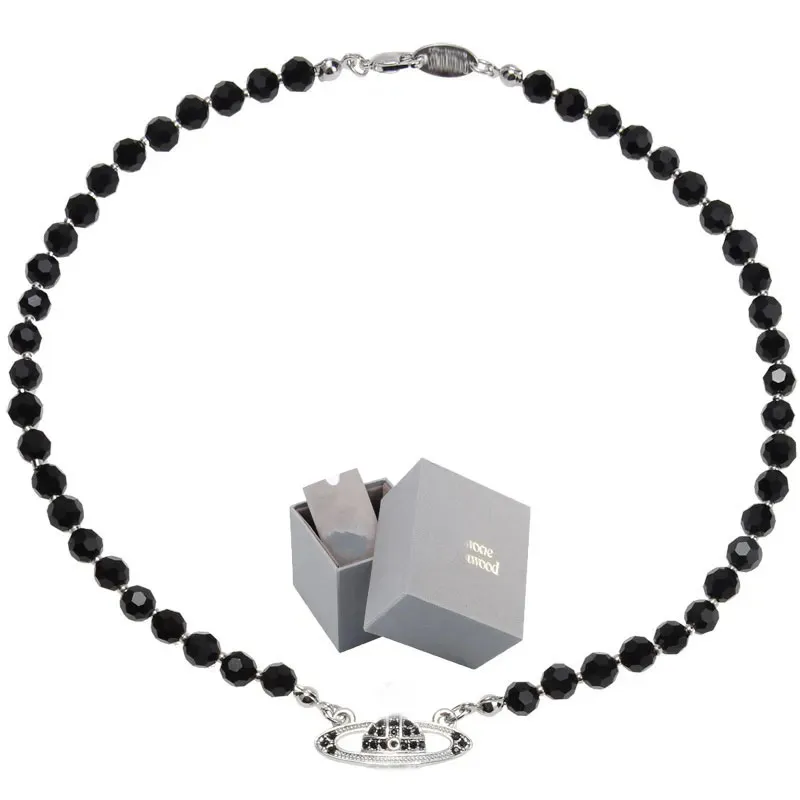 Collier de diamant complet en cristal noir Saturne Chaîne de clavicule de style sombre peut être porté par les hommes et les femmes avec un rassemblement de mode en boîte
