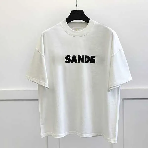 Eur Designer Moda Clássico Jil Sander Camisa Casual Mens Mulheres Carta Impressão Casais T Estilo Simples Solto Manga Curta Oversized WQ0F