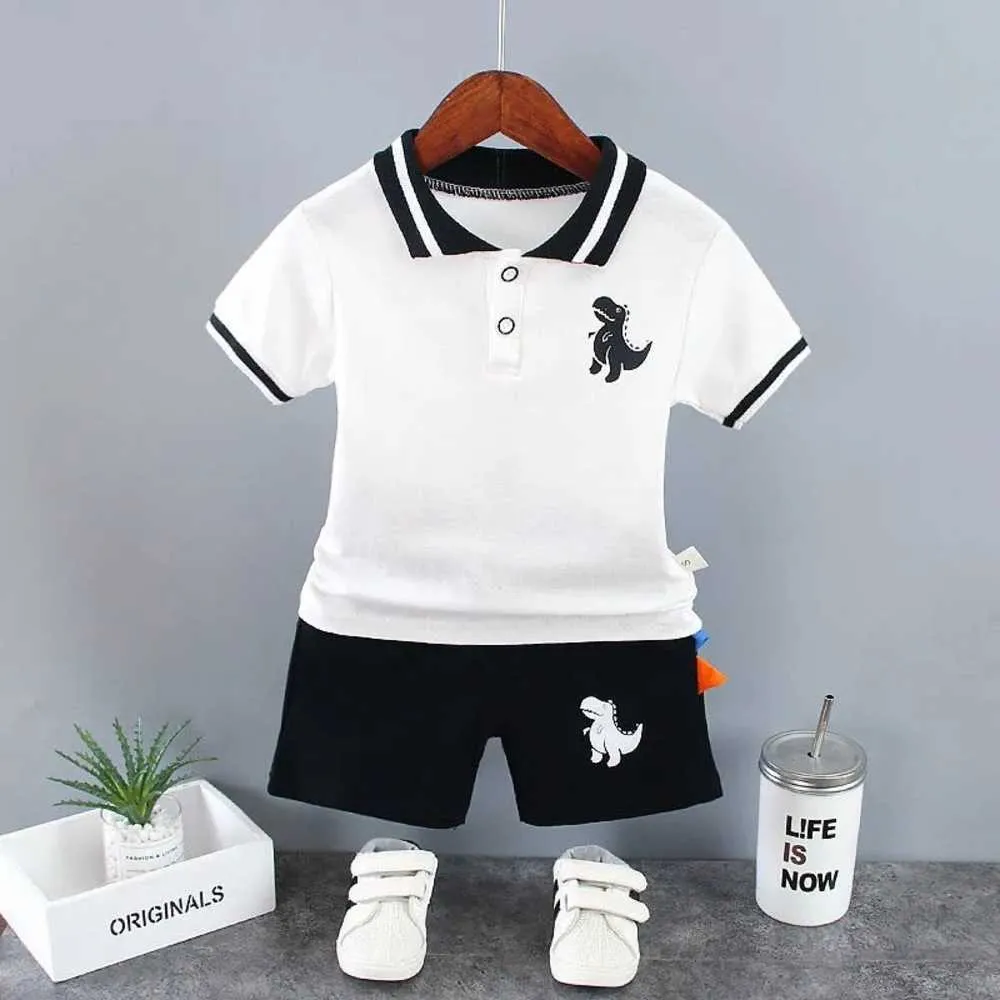 Pur coton coréen enfants vêtements garçons ensemble 2023 nouveaux polos à manches courtes pour les enfants de petite et moyenne taille tendance de la mode estivale