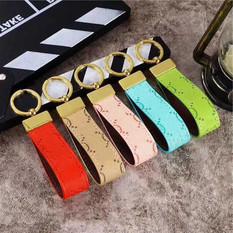 Top Quality Cowhide Designer Belt Keychain For Men And Women 10