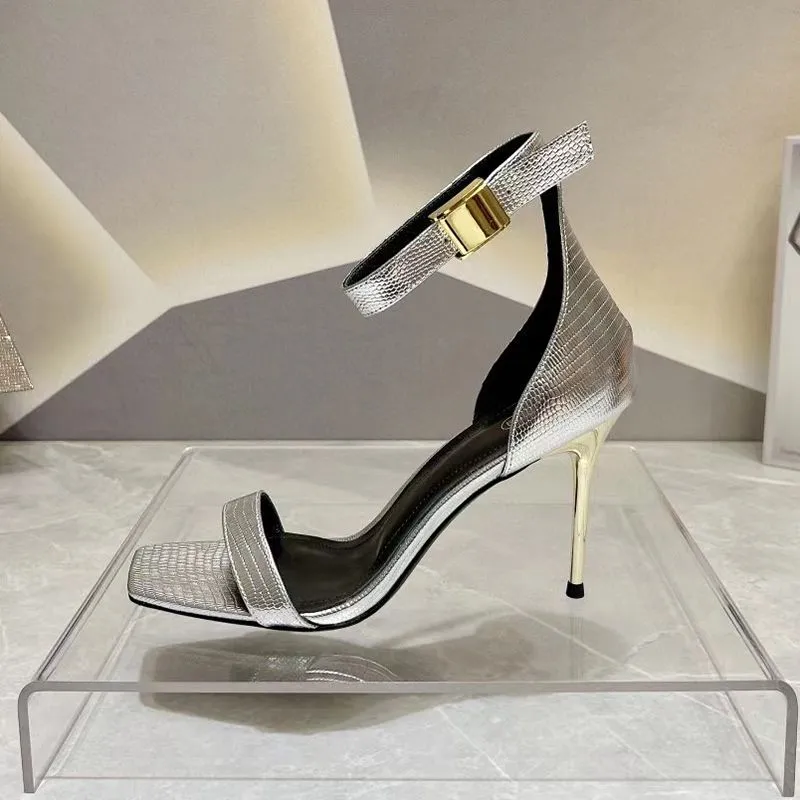 Metallic gold ankle clearance strap heels