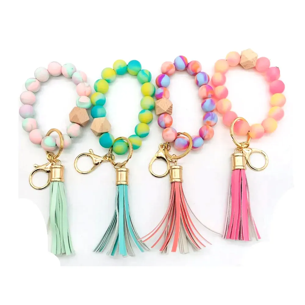 Handmade stretched spring rainbow silicone beads bangle keychains pu leather tassel wristlet bracelet keyrings for 2022