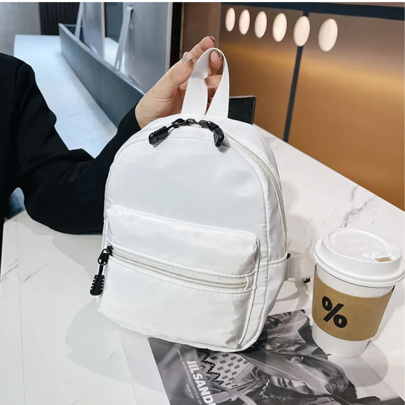 Borse da scuola Mini zaini da donna Borsa da donna in nylon di tendenza Piccolo zaino bianco per zaino casual da studente per ragazze adolescenti 230629