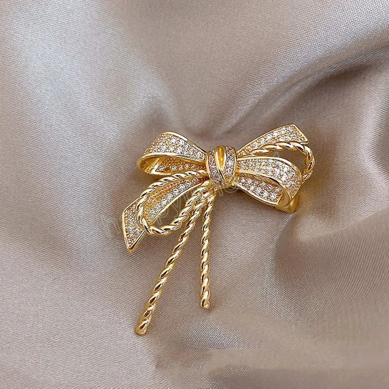 Élégant strass nœud papillon broche épinglette Corsage femmes Simple robe manteau Cardigan bijoux de mariage cadeau broche broche broche