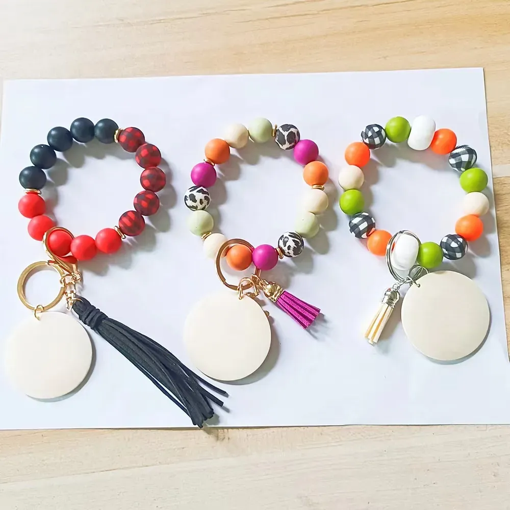 Gros bracelet en perles de silicone coréen velours pompon porte-clés femmes options multicolores