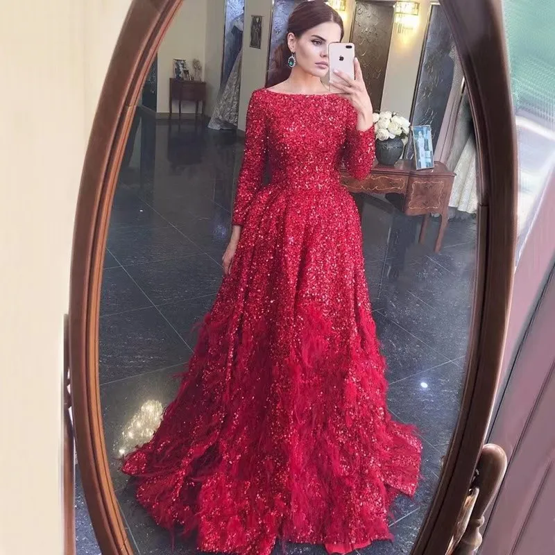 Abiti da ballo a sirena rossa Senza maniche manica lunga 3D Appliques in pizzo Paillettes Scollo a barchetta in rilievo Celebrity Formal Plus Size Custom Made Feather Train Abiti da sera