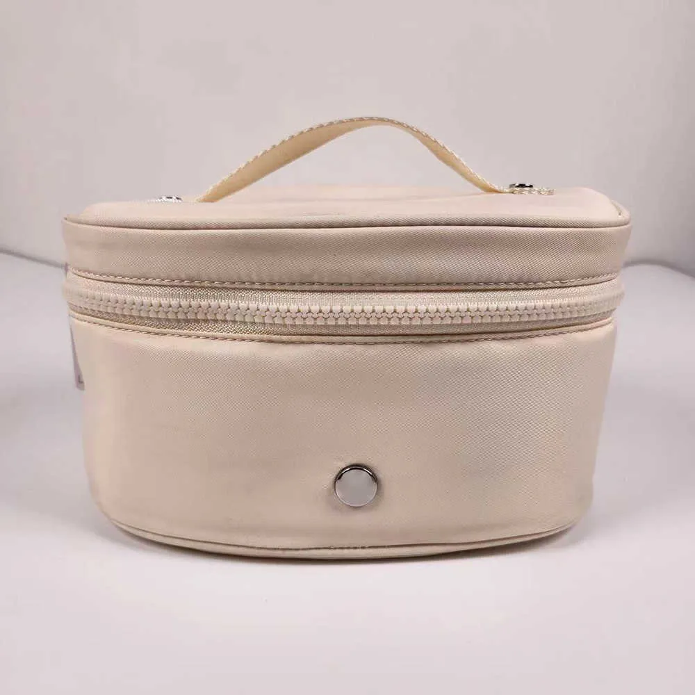 Ovale topzakken Cosmetische tassen Luxe designertas Make-uptasje voor dames Waterbestendige duffel Designerportemonnee Nylon handtas Reizen Wassen Toilettassen 231115