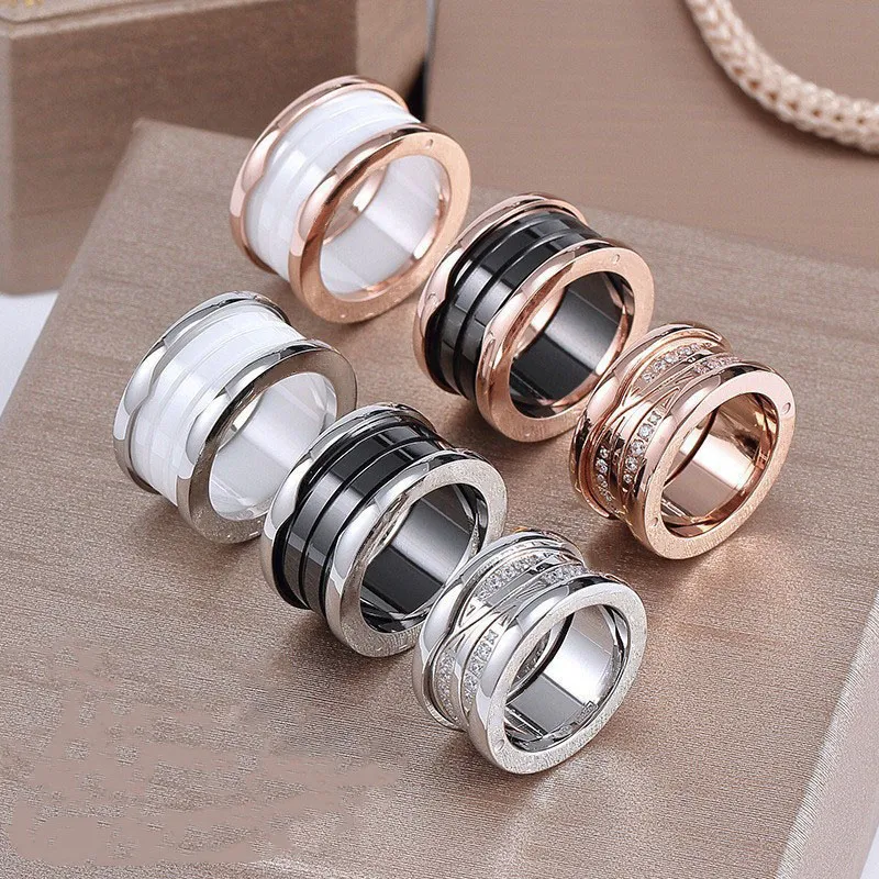 Mode Unisex Designer Luxe ringen Paar voor Mannen Vrouwen Titanium Staal Gegraveerd Letter Patroon Liefhebbers Sieraden Geschikt voor vele toepassingen Ananas maat 5-11