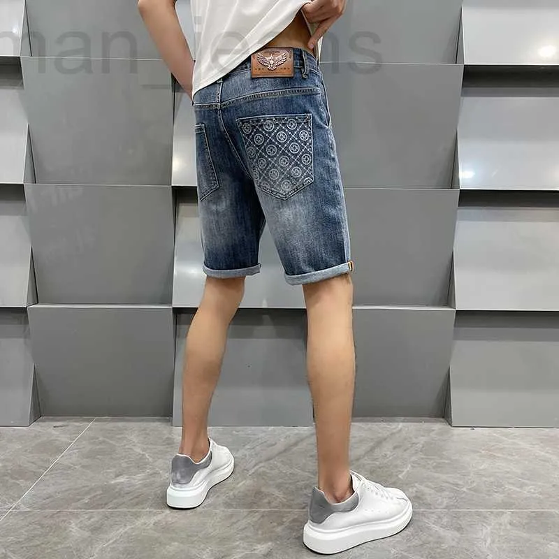 Mäns jeansdesigner Nya europeiska denimshorts för mäns avslappnad trend, rufsade och stiliga mittbyxor, sommar tunn rak ben fem stycken tryckt 44bt