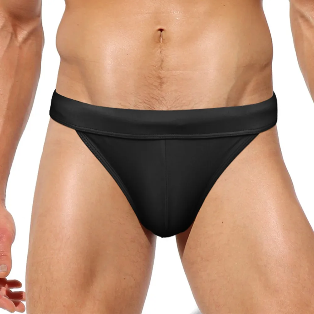 Roupa de banho masculina Sexy calção de banho masculino de garfo alto Triângulo Biquíni de praia de cor sólida Bolsa grande Tanga GString Shorts 230630