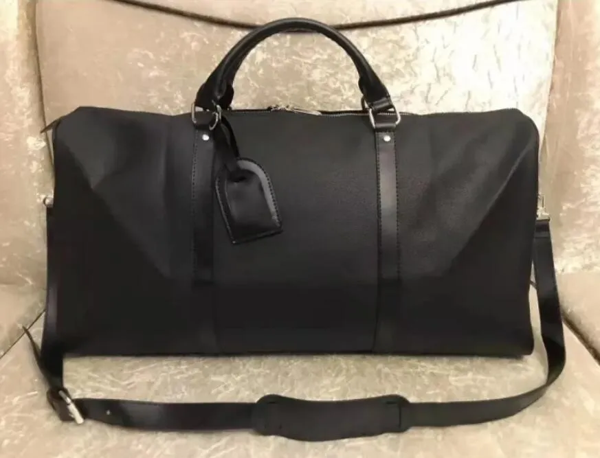 Designers Fashion Duffel Bags Luxury Men Female Travel Bags Leather Handbags Large Capacity Holdall Carry On Luggage Overnight Weekender Bag 54cm From 36 03 DHgate