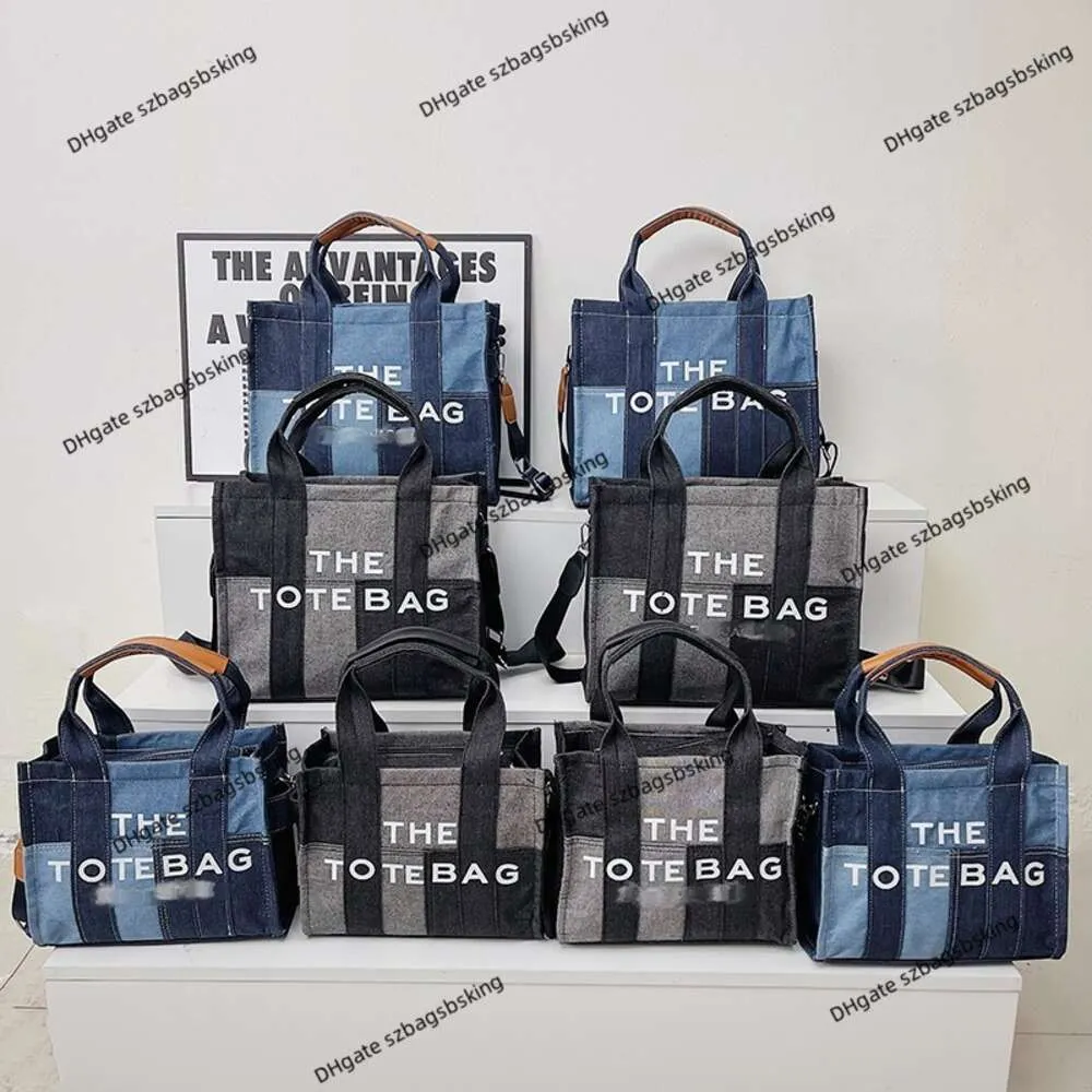 ファッションレディースバッグショップ工場卸売豪華なショルダーハンドバッグの卸売販売クラシックデニムプリントレタートートハンドショッピングクロスボディバッグ