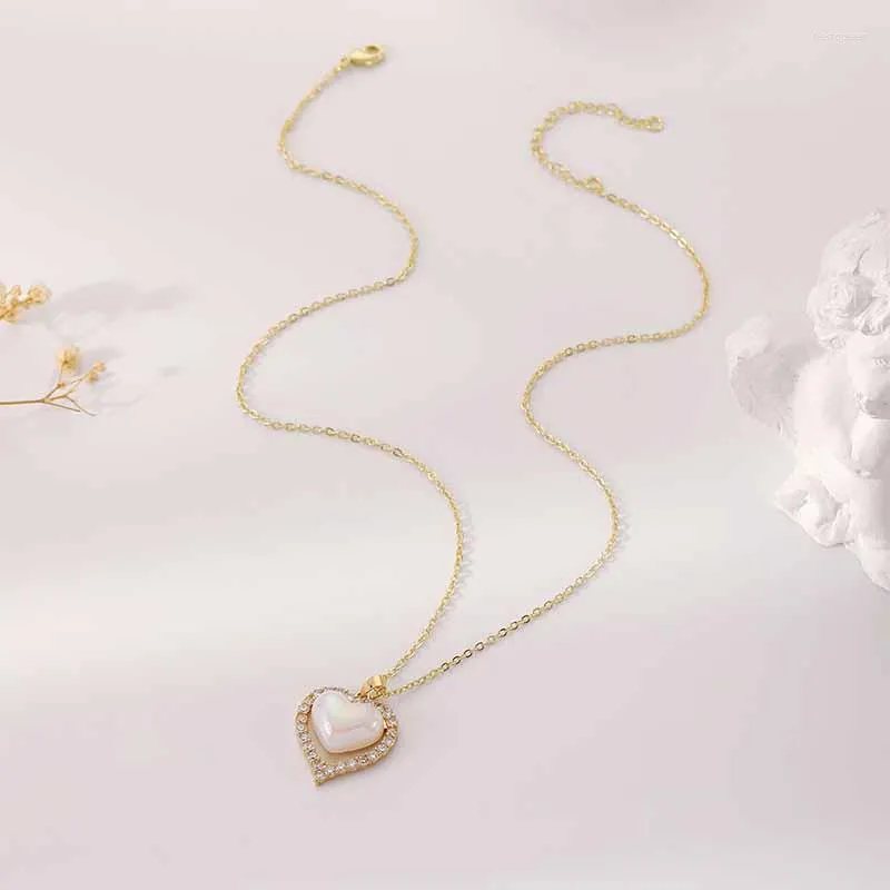 Cadenas Pearl Rhine Stone Heart Collar Colgante Cadena delgada Mujeres Chapado en oro Joyería de moda Regalo de fiesta 2023 Estilo HN23N