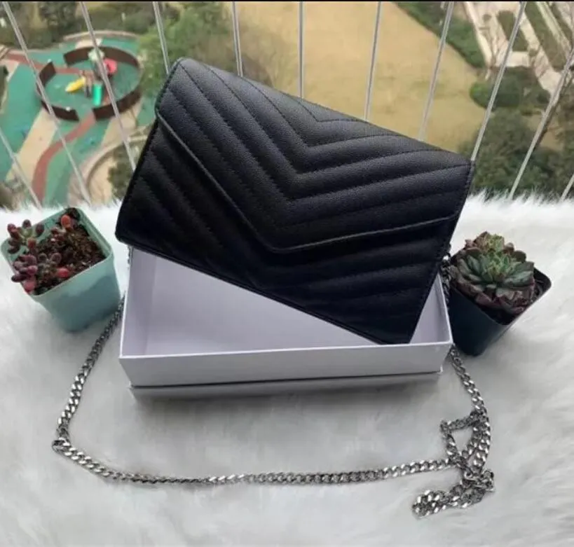 Buy SAINT LAURENT Black Large Cassandre Envelope Pouch in Grained Lambskin  for Men in Saudi | Ounass