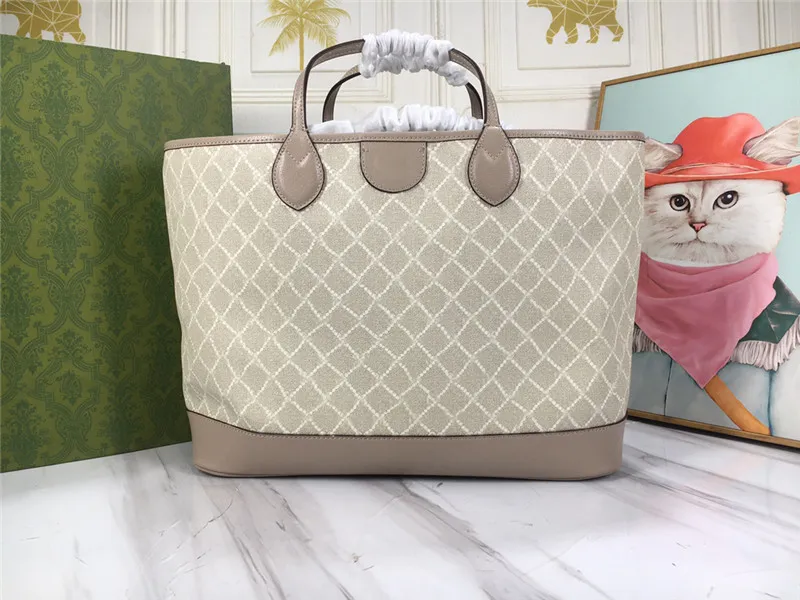 Designer coated canvas tote hotsell