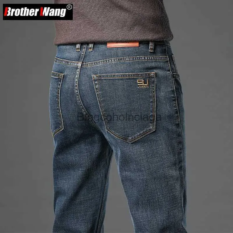 Jeans da uomo 2023 Autunno nuovi uomini in cotone elasticizzato slim jeans versione dritta business moda denim pantaloni vintage blu pantaloni di marca neroL231003