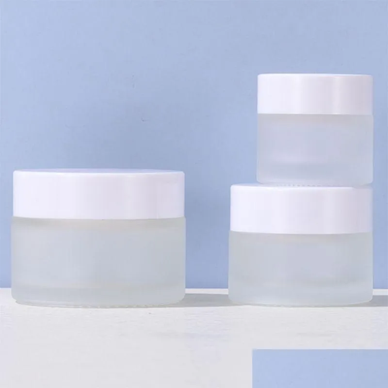 Bouteilles d'emballage en gros verre dépoli crème pot cosmétique bouteille lotion baume à lèvres conteneur avec couvercle blanc 5G 10G 15G 20G 30G 50G 100G Dhzj9