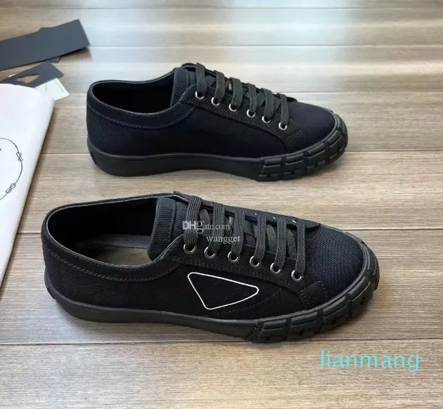 Scarpe da ginnastica in pelle di tela bianca nera di design sportivo Scarpe con suola in gomma Slip-on da esterno per uomo Skateboard Walking Calzature all'ingrosso