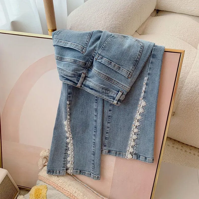 Kvinnors jeans ljusblå hög midja chic flare byxor broderade flares denim blixtlås koreanska delade kvinnor sommar y2k eleganta byxor