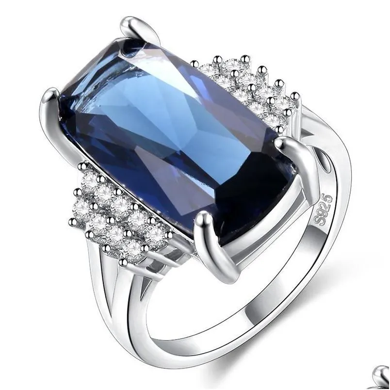 Clusterringen Blauw Kristal 925 Sier Ring Sprankelende Cz Vintage Mode Elegant Fit Verjaardagsbanket Voor Vrouwen Prinses Drop Delivery Dhazv